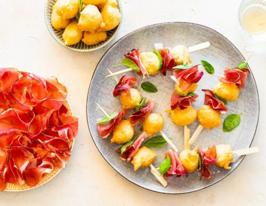 Parmesankrapfen mit Südtiroler Speck