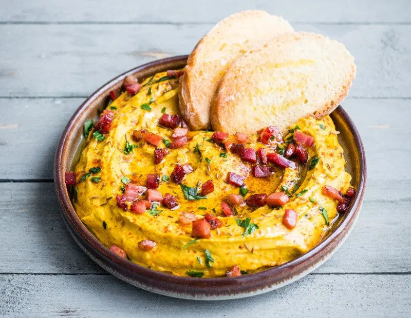 Ricetta hummus di zucca con speck altoatesino IGP e crostini